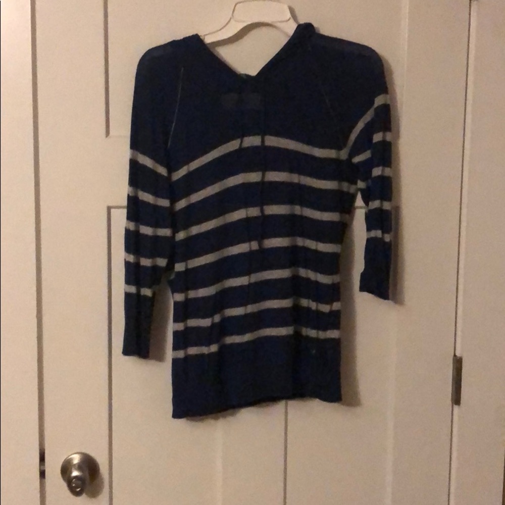 Quarter length sweater with hood